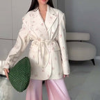 Oversized belted blazer with puff sleeves – Modern and sophisticated elegance