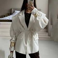 Oversized belted blazer with puff sleeves – Modern and sophisticated elegance