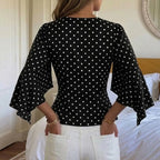 Vue de dos de la blouse noire à pois blancs SecretBombe